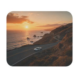 May include: A white sports car driving along a winding coastal highway during a golden sunset. The road curves beside steep cliffs overlooking the ocean, where waves break against scattered rocks under a bright, warm, orange-hued sky.