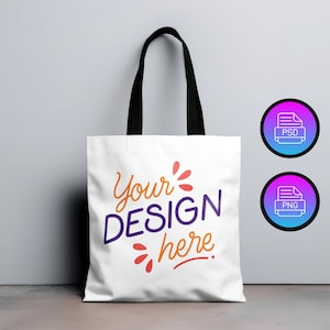 Könnte beinhalten: Weiße Einkaufstasche mit schwarzen Henkeln. Die Tasche trägt den Text "Your DESIGN here" in lila und orangefarbener Schrift mit einem stilisierten Sonnenstrahlen-Design.