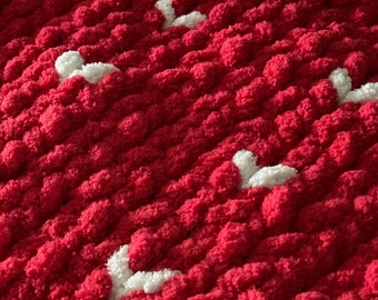 Magenta and white heart chunky knit medium size pet blanket.
