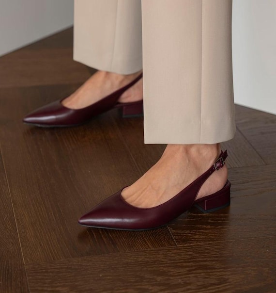 cuero vas zapatos de tacon