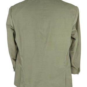 May include: Back view of a light green blazer. The blazer has a notched lapel, two buttons on the sleeves, and a two-button closure. The fabric has a subtle vertical texture. The blazer is displayed on a mannequin.