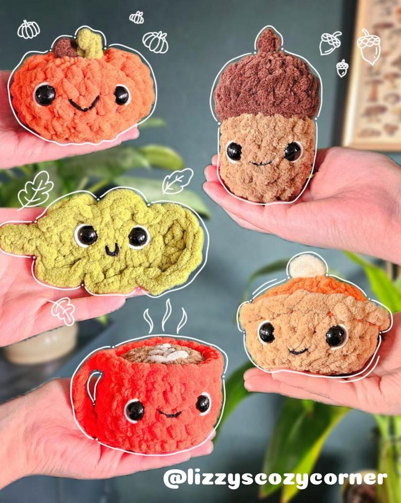 May include: A selection of crocheted plush toys, including a pumpkin, acorn, cloud, coffee cup, and pie. Each item has a smiling face and a white outline. The Instagram handle @lizzyscozycorner is displayed at the bottom of the image.
