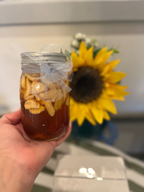 Organic honey infused fermented garlic. Immunity boosting power!  glass pint