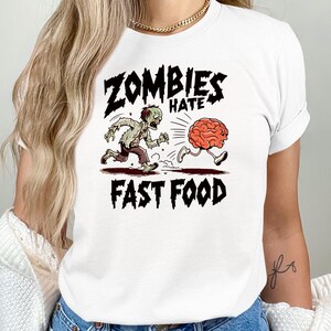 Funny Halloween T-Shirt, Zombies Hate Fast Food Humor, Halloween Costume Shirt, Spooky Zombie Graphic Tee, Men Women Unisex Gift