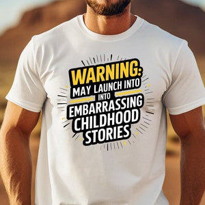 T-shirt divertente di avvertimento, può lanciarsi in storie d'infanzia imbarazzanti, maglietta con grafica umoristica, unisex
