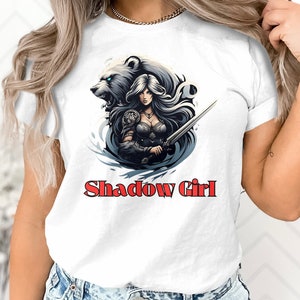 Shadow Girl Warrior Bear Graphic T-Shirt, Fantasy Artwork Tee, Women&#39;s Stylish Shirt, Bold Print Design