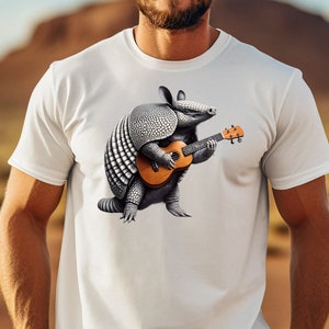 Gürteltier, das Ukulele spielt T-Shirt, einzigartiges Tiermusiker-Grafik-T-Shirt, lustiges Neuheits-Shirt, Geschenk für Musikliebhaber