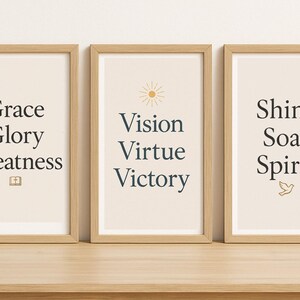 May include: Three framed prints with inspirational words. The first print has the words "Grace, Glory, Greatness" with a small image of an open book. The second print has the words "Vision, Virtue, Victory" with a small image of a sun. The third print has the words "Shine, Soar, Spirit" with a small image of a dove.