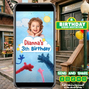 May include: A smartphone displays a birthday video invitation. The invitation features a photo of a smiling child, the text "Dianna's 3th Birthday", and cartoon characters. The background is a blue sky with a sun and clouds. The phone is in front of a street scene.