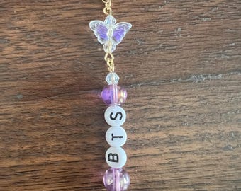 Charm con cierre de langosta de mariposa del ejército de BTS