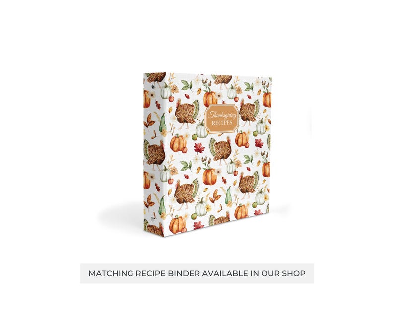May include: A white recipe binder with a Thanksgiving theme. The cover features a repeating pattern of turkeys, pumpkins, and fall leaves. The text "Thanksgiving Recipes" is printed in brown on the cover.