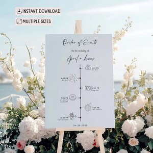 May include: A white wedding sign with a black timeline of events for the wedding of April and Lucas. The sign includes the date 04.26.2025 and icons for each event, such as a champagne glass for the cocktail hour, a plate for dinner, and a disco ball for dancing.