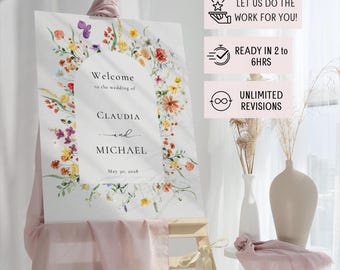 Pode incluir: Um sinal de boas-vindas de casamento em aquarela com um design de coroa de flores. O sinal diz "Bem-vindos ao casamento de Claudia e Michael 30 de maio de 2018".