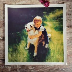 May include: A young person with brown hair is hugging a brown and white dog. The dog is sitting on its hind legs and the person is holding the dog's neck with their arms. The dog and person are in a grassy field.