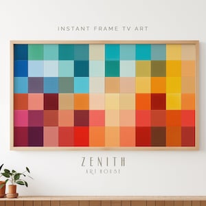 May include: A framed abstract art print with a geometric pattern of colorful squares in shades of blue, green, yellow, orange, red, and brown. The frame is made of light wood. The print is titled "ZENITH ART HOUSE".