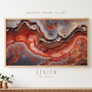 May include: A framed print of a close-up of a red, orange, and brown agate stone with intricate patterns. The print is in a wooden frame and has the text "ZENITH ART HOUSE" at the bottom.