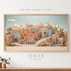 May include: A framed digital art print featuring a whimsical village scene with colorful buildings, a winding road, and stylized trees. The artwork is set against a light blue sky and is labeled "INSTANT FRAME TV ART" and "ZENITH ART HOUSE".