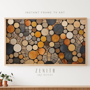 May include: A framed abstract artwork featuring a mosaic of wood slices in shades of brown, beige, grey, and yellow. The wood slices are arranged in a circular pattern, creating a unique and modern design. The frame is made of natural wood.