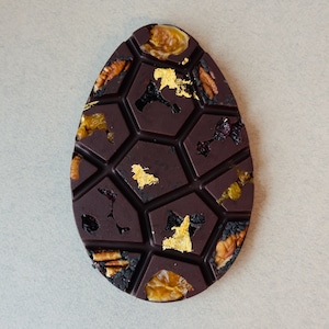 Chocolate Easter Egg With Dried Fruits and Pecan Nut