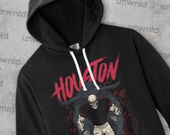 Könnte beinhalten: Schwarzer Kapuzenpullover mit Kordelzug und einer Grafik eines Skelett-Footballspielers mit dem Wort "HOUSTON" in Rot. Das Design beinhaltet einen Bullenkopf und rote Raucheffekte.