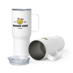 Travel mug with a handle