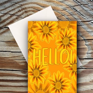 May include: A greeting card with a bright orange background and a yellow "HELLO!" message. The background is decorated with a pattern of yellow and orange flowers.