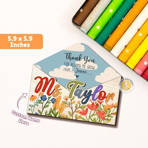 May include: A wooden teacher appreciation gift in the shape of an envelope with a floral design and the text "Thank You for helping me grow from... Jessica" and "Ms. Taylor".