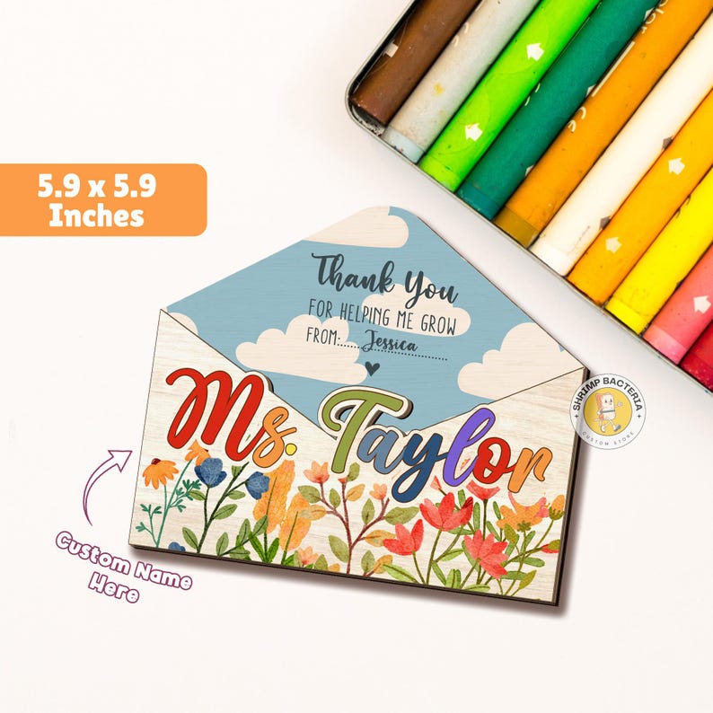 May include: A wooden teacher appreciation gift in the shape of an envelope with a floral design and the text "Thank You for helping me grow from... Jessica" and "Ms. Taylor".
