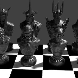 May include: A black and white chess set featuring characters from The Lord of the Rings. The pieces are arranged on a black and white chequered board.