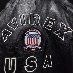 May include: A rustic wooden sign with the text "Welcome to our home" in white lettering. The sign features a distressed finish and a simple, inviting design, perfect for a front porch or entryway.