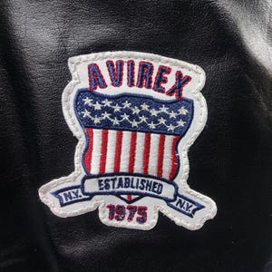 May include: A rustic wooden sign with the text "Welcome to our home" in white lettering. The sign features a distressed finish and a simple, inviting design, perfect for a front porch or entryway.