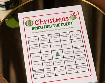 May include: A white Christmas Bingo game card with a green and red border. The card features the text "Christmas Bingo Find the Guest" and includes various prompts for players to find guests who match the descriptions.