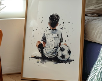 May include: A watercolor painting of a young boy sitting with a soccer ball. He is wearing a white jersey with the name "SAMUEL" and the number "3" on the back. The painting has a white background with black splatters.