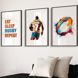 May include: Three framed prints with a rugby theme. The left print has the text "Eat Sleep Rugby Repeat". The middle print shows a rugby player in a yellow and blue jersey with the name "Mason" and the number "7" on the back. The right print shows a colourful abstract design of a rugby ball.