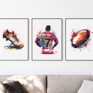 May include: Three colourful watercolour paintings of rugby equipment. The first painting shows a rugby boot, the second shows a rugby player with the name "MASON" and the number "7" on the back of their jersey, and the third shows a rugby ball.