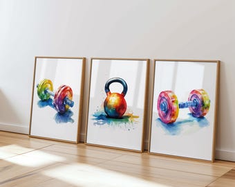 May include: Three framed watercolor paintings of colorful weightlifting equipment. The first painting shows a dumbbell with a blue, green, yellow, and red color scheme. The second painting shows a kettlebell with a red, orange, yellow, and blue color scheme. The third painting shows a dumbbell with a blue, green, yellow, and red color scheme.
