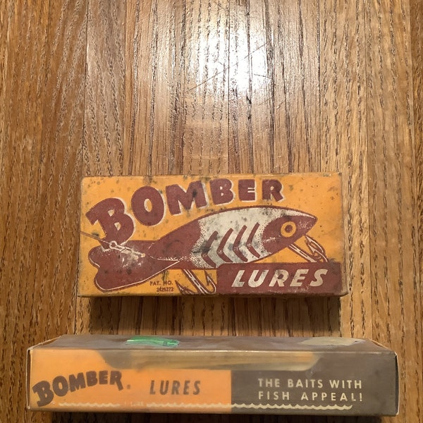 2 vintage bomber lures in original box