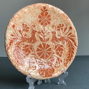 A sgraffito plate. Ukrainian decor