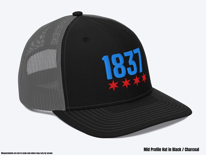 May include: A black and charcoal gray trucker hat with a blue and red embroidered design. The design features the number "1837" and five red stars.