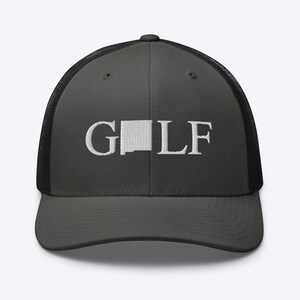 May include: Black and gray trucker hat with a white embroidered outline of the state of New Mexico and the word "GOLF" above it.