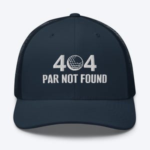 May include: A navy blue trucker hat with a white embroidered golf ball and the text "404 PAR NOT FOUND".
