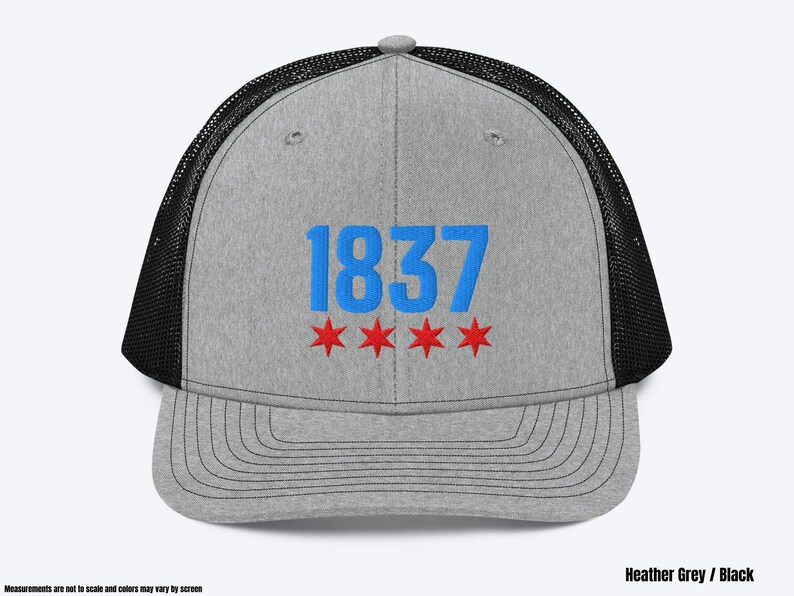 May include: A heather grey and black trucker hat with the number "1837" embroidered in blue and three red stars.