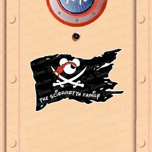 May include: A black pirate flag with a Mickey Mouse head and crossed swords. The text "THE SCIORROTTA FAMILY" is written on the flag.