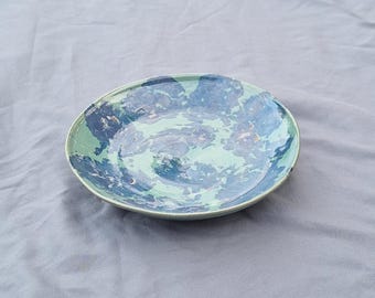 Handgemaakte keramieken groenblauw en blauw bord