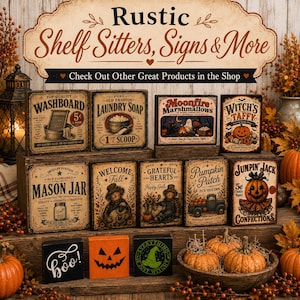 May include: A collection of rectangular wooden signs with vintage-style graphics featuring themes like laundry, pumpkins, and Halloween. The signs display text such as Washboard, Moonfire Marshmallows, Witch's Taffy, Mason Jar, and Jumpin Jack Confections.