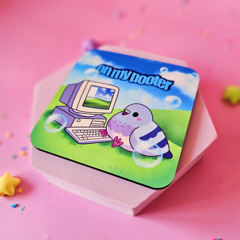 May include: Square coaster with a cartoon pigeon next to a retro computer, set against a green field and blue sky background. The text "on my hooter" is printed on the top. Bubbles are also included in the design.