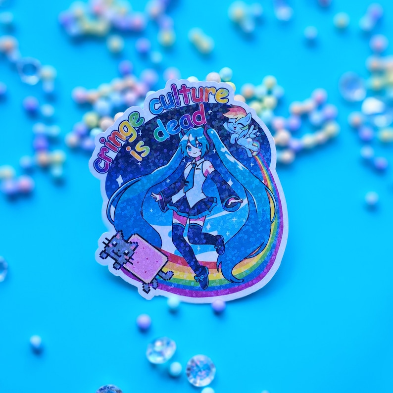 May include: A blue and white sticker featuring a cartoon character with long blue hair and a rainbow. The sticker reads "Cringe culture is dead".