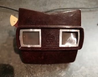 Rare bakelite Viewmaster Stereoscope with 8 reels and original package