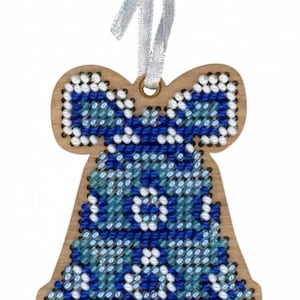 May include: Wooden bell-shaped ornament with a bow at the top, decorated with blue and white beads. The ornament is suspended by a white ribbon. The bell design features a pattern of blue and white beads.
