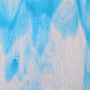 May include: Abstract art piece featuring a textured white surface with vibrant blue, zigzagging patterns. The blue paint appears to be applied in a watercolor style, creating a dynamic and visually engaging design.